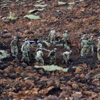Ground Self-Defense Force troops search for survivors at a landslide site after earthquakes in Minamiaso, Kumamoto Prefecture, on Sunday. | AFP-JIJI