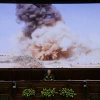 Lt. Gen. Sergei Rudskoi of the Russian military\'s General Staff speaks at a briefing in Moscow on Monday. The Russian military says it is helping the Syrian army fight the al-Qaida-affiliated Nusra Front around Aleppo, but has no plan to storm the city. | AP