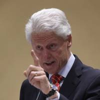 Former President Bill Clinton addresses the General Conference of the African Methodist Episcopal Church meeting in Philadelphia Thursday. | CLEM MURRAY / THE PHILADELPHIA INQUIRER VIA AP