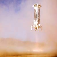 Blue Origin\'s New Shepard booster lands on Saturday near Van Horn, Texas. | AFP-JIJI