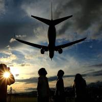 An airplane comes in to land at Osaka International Airport in this undated file image. Aspiring females aim sights at solving pilot crisis dogging Asian airlines