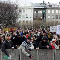 People demonstrate against Iceland Prime Minister Sigmundur David Gunnlaugsson in ReykjavikTuesday. Gunnlaugsson became the first major casualty of the \"Panama Papers\" revelations, stepping down on Tuesday after leaked files showed his wife owned an offshore firm with big claims on the country\'s collapsed banks. | REUTERS