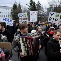 People demonstrate against Iceland Prime Minister Sigmundur David Gunnlaugsson in Reykjavik Tuesday. | REUTERS