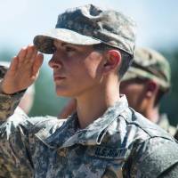 Cpt. Kristen Griest and U.S. Army Ranger School Class 08-15 render a salute during their graduation at Fort Benning, Georgia, on Aug. 21, 2015. Griest and class member 1st Lt. Shaye Haver became the first female graduates of the school. | U.S. ARMY PHOTO BY STAFF SGT. STEVE CORTEZ
