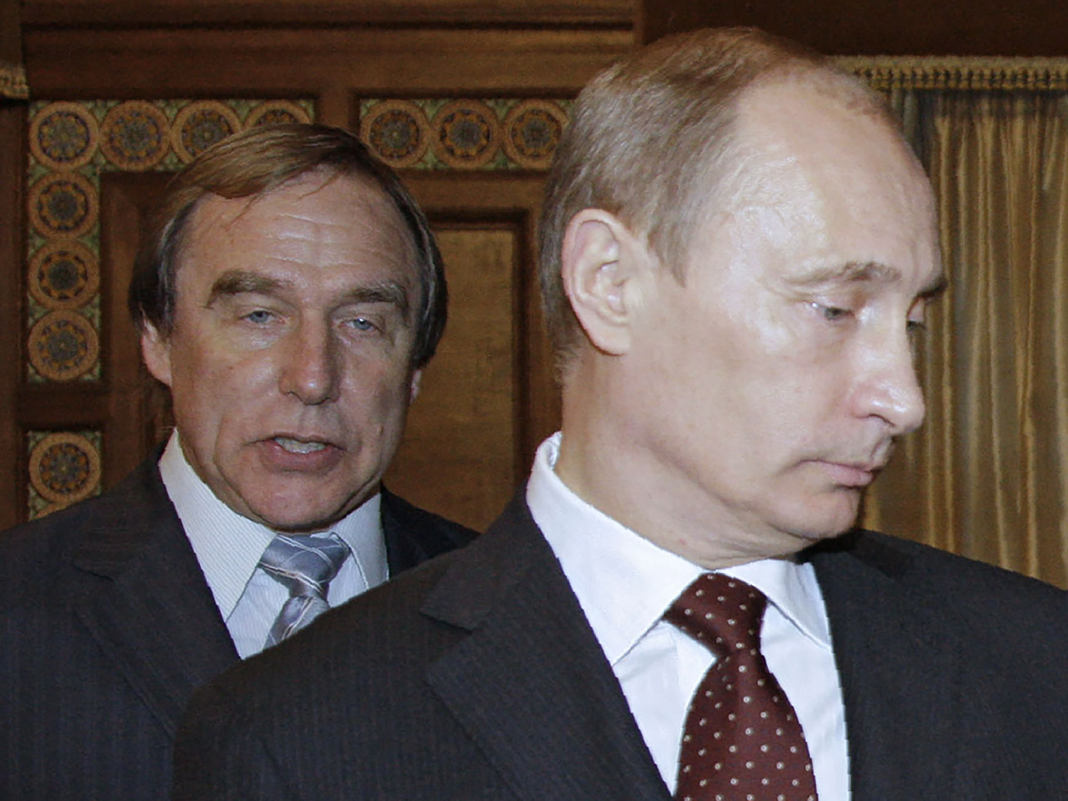 Russian President Vladimir Putin is seen with concert cellist Sergei Roldugin in 2009. A leak of documents from a Panamanian law firm puts Roldugin among those at the top of a multibillion-dollar offshore empire. | AFP-JIJI