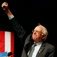 Democratic presidential candidate Bernie Sanders (left) and Republican presidential candidate Ted Cruz gesture to supporters at campaign rallies on Wednesday. Both candidates won the primary elections in Wisconsin. | REUTERS / AP