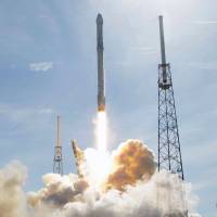 The SpaceX Falcon 9 rocket lifts off Friday from Kennedy Space Center in Cape Canaveral, Florida. | AP