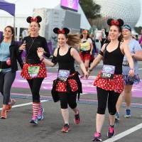 Many runners dress up for the popular half-marathons at Disney, where photo ops with costumed characters are as important as race times. Running at Disney is all about costumes