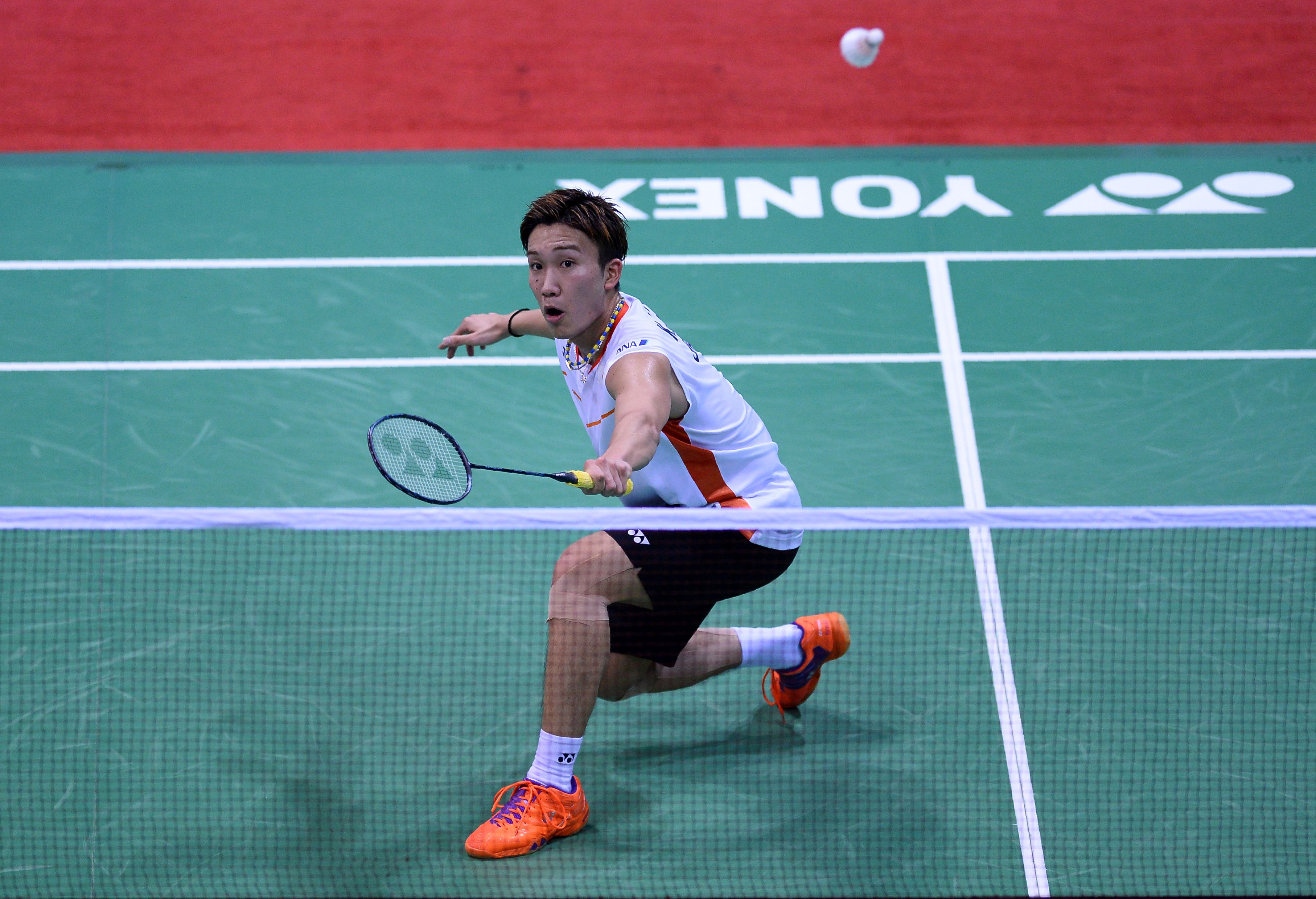 Kento Momota plays a shot during his men's singles semifinal match against China's Xue Song at the Yonex-Sunrise India Open 2016 badminton tournament in New Delhi on Saturday. | AFP-JIJI