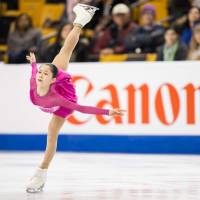 Satoko Miyahara skates during a practice session at the world championships in Boston last week. | AFP-JIJI