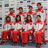 Japan head coach Norimasa Hirai (top row, far left) and some of the members of the national team for the Rio de Janeiro Olympics pose for a photo at Tokyo\'s National Training Center on Monday. | KAZ NAGATSUKA
