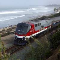 An Amtrak passenger train passes through Del Mar, north of San Diego. | REUTERS