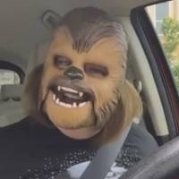 Candace Payne of Texas films a Facebook Live video of herself wearing an electronic mask of the character Chewbacca from the film \"Star Wars\" in this screen shot taken from YouTube. | REUTERS