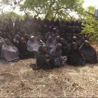 This May 12, 2014, file image, taken from video by Nigeria\'s Boko Haram terrorist network, shows the alleged missing girls abducted from the northeastern town of Chibok. | AP