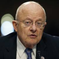 Director of the National Intelligence James Clapper speaks Feb. 9 on Capitol Hill in Washington. Clapper said Wednesday that the U.S. has already seen evidence that cyberhackers, possibly working for foreign governments, are snooping on the presidential candidates, and government officials are working with them to tighten security as they expect the problem to grow as the campaigns intensify. | AP