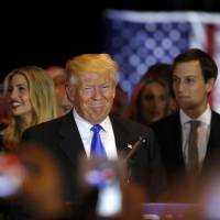 Republican U.S. presidential candidate and businessman Donald Trump arrives at his campaign victory party to speak to supporters after his rival, Sen. Ted Cruz, dropped out of the race following the results of the Indiana state primary, at Trump Tower in Manhattan, New York, Tuesday. | REUTERS