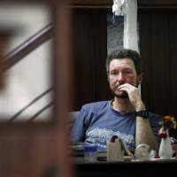 Australian climber Robert Gropels, who lost his wife, Maria Strydom, at Mount Everest, sits in his Kathmandu hotel room on Tuesday after being rescued. Nearly 300 people have died on Everest in the last century. Death on Everest: Some climbers become monuments