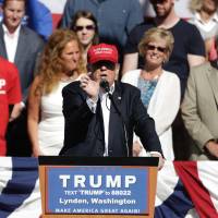 U.S. Republican presidential candidate Donald Trump addresses a campaign rally at the Northwest Washington Fair and Event Center in Lynden, Washington, Saturday. Trump OK with GOP unity but on his terms as pal Palin looks to back rival to Ryan