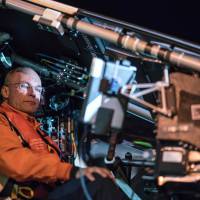 Swiss pilot Bertrand Piccard sits Thursday in the cockpit of the experimental solar-powered aircraft Solar Impulse 2 prior to taking off from Phoenix, Arizona, en route to Oklahoma, for the latest stage of its around-the-world flight aimed at drawing attention to clean energy technologies. | JEAN REVILLARD / SOLAR IMPULSE 2 / AFP-JIJI