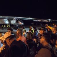 Team members and media await the takeoff of Solar Impulse 2, a solar powered airplane, at Phoenix Goodyear Airport on Thursday. | SI2/ JEAN REVILLARD / HANDOUT VIA REUTER