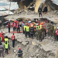 Rescue workers Thursday continue to search for survivors in the rubble of a six-story building that collapsed in the Huruma neighborhood of Nairobi last Friday night. | REUTERS