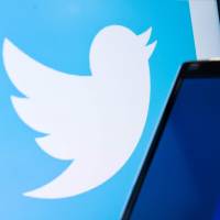 The logo of social-networking website Twitter is displayed on a computer screen in London. | AFP-JIJI