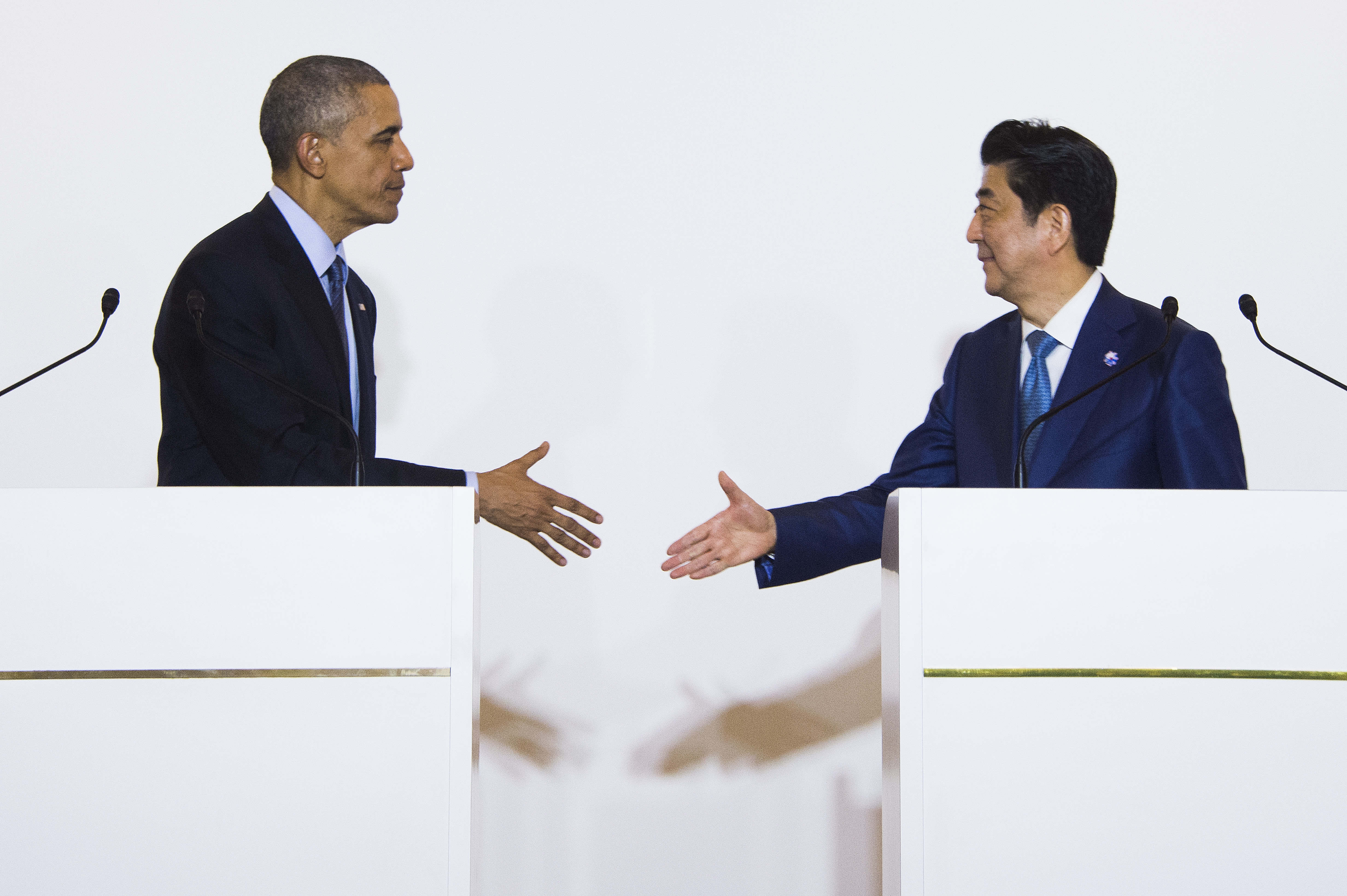 U.S. President Barack Obama and Prime Minister Shinzo Abe appear together at a news conference after meeting in Shima, Mie Prefecture, on Wednesday evening. | AFP-JIJI