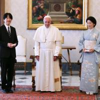 Prince Akishino and his wife, Princess Kiko, pose with Pope Francis during a private audience at the Vatican on Thursday. | AFP-JIJI