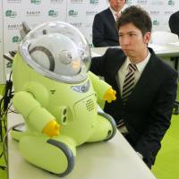 A humanoid robot shown in this photo taken on March 24, 2015, in Nagoya, is one of the efforts to help children with developmental disabilities improve their communication skills. | KYODO