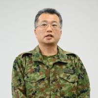 Jun Setoguchi, spokesman of the Ground Self-Defense Force\'s Northern Army Headquarters in Sapporo, apologizes Tuesday over its members\' shooting of live rounds by mistake in a drill. | KYODO