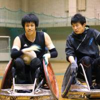 Rugby player Takumi Wachi (left) practices on March 19 in Iwamizawa, Hokkaido. | KYODO