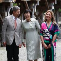 Partners of the G-7 leaders &#8212; Christiane Juncker, wife of European Commission President Jean-Claude Juncker, Joachim Sauer, husband of German Chancellor Angela Merkel, first lady Akie Abe and Sophie Gregoire-Trudeau, wife of Canada\'s Prime Minister Justin Trudeau, share a laugh as they pose for a photograph next to Ujibashi bridge during a visit to Ise-Jingu Shrine in the city of Ise, Mie prefecture, on Thursday. | POOL/ AFP-JIJI