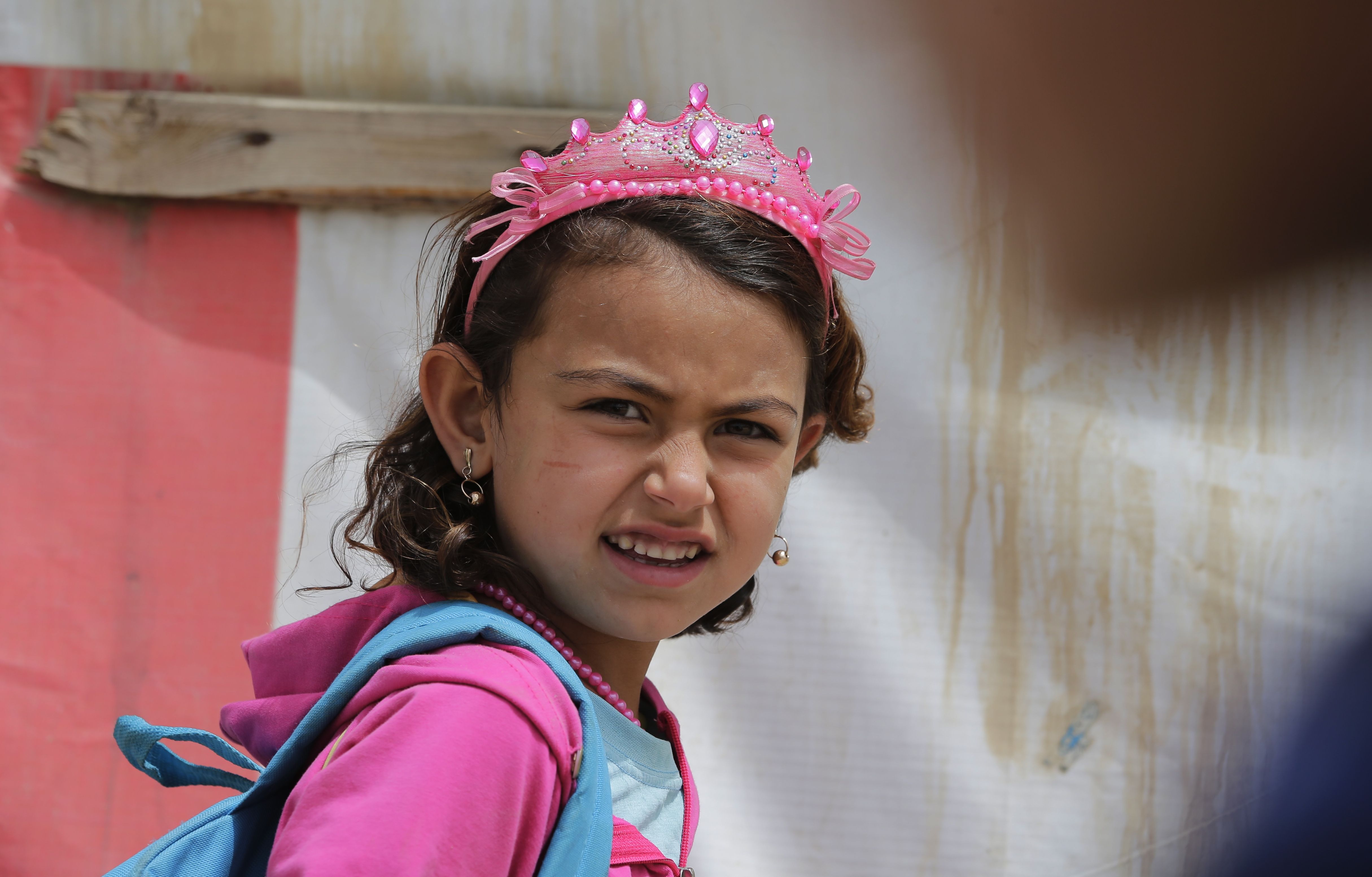 A Syrian refugee heads to school at a camp in the town of Bar Elias, Lebanon, on May 13. | AFP-JIJI