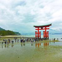 Poetic backdrop: The torii gate at Itsukushima Shrine is one of the  most photographed spots in Japan. | SHAUN MCKENNA