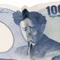 Frowning future:  The otherwise calm countenance of Hideyo Noguchi on a &#165;1,000 bill is folded into a look of concern. The nation is haunted by poverty and boredom, according to recent statistics and a report by Shukan Toyo Keizai magazine. | ISTOCK