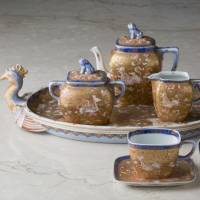 Coffee set with phoenix-shaped tray sporting a design of a kirin (a mythical creature), birds and flowers in overglaze polychrome enamels (1875-80s) by Koransha | COLLECTION OF SHOBIDO-HONTEN CO., LTD., PHOTOs\\ BY SEKAI BUNKASHA