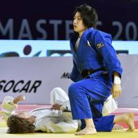 Misato Nakamura defeats Natalia Kuziutina on Friday in Guadalajara, Mexico. | KYODO