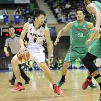 Aisin guard Makoto Hiejima (6) dribbles against the Toyota defense during Game 2 of the NBL playoff semifinals on Sunday. SeaHorses upset Alvark to book place in NBL Finals