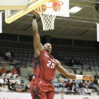 Toshiba forward Mamadou Diouf dunks in a 2015-16 regular-season game in Kawasaki. The Brave Thunders advanced to the NBL Finals on Monday with a 69-60 win over the Link Tochigi Brex in Game 3 of the playoff semifinals. | KAZ NAGATSUKA