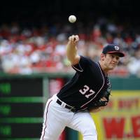 Nationals starter Stephen Strasburg pitches during his team’s game against the Cardinals on Sunday. Strasburg, Werth power Nationals