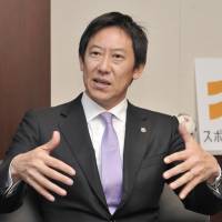 Sports Agency Commissioner Daichi Suzuki speaks at the education ministry last month. | YOSHIAKI MIURA