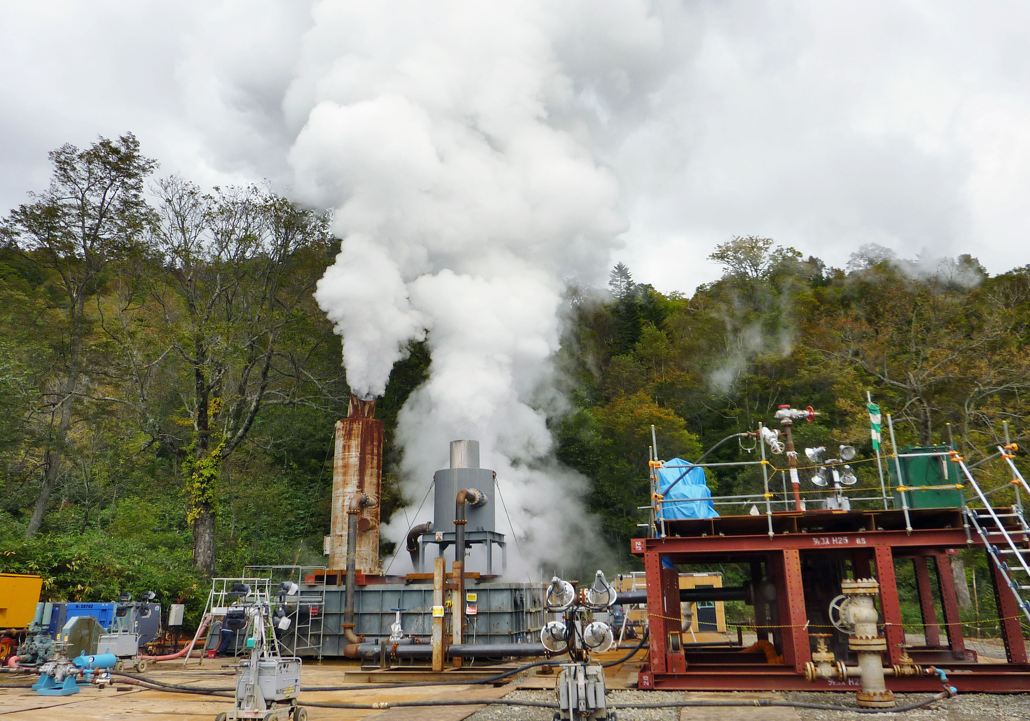 Steam emerges from a well dug to test geothermal power generation in Hokkaido in October 2015. | KYODO