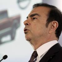 Carlos Ghosn, CEO of Nissan Motor Co., addresses a news conference in Yokohama on May 12. | BLOOMBERG