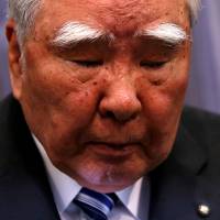 Suzuki Motor Corp. Chairman and CEO Osamu Suzuki attends a news conference at the transport ministry in Tokyo on Wednesday. | REUTERS