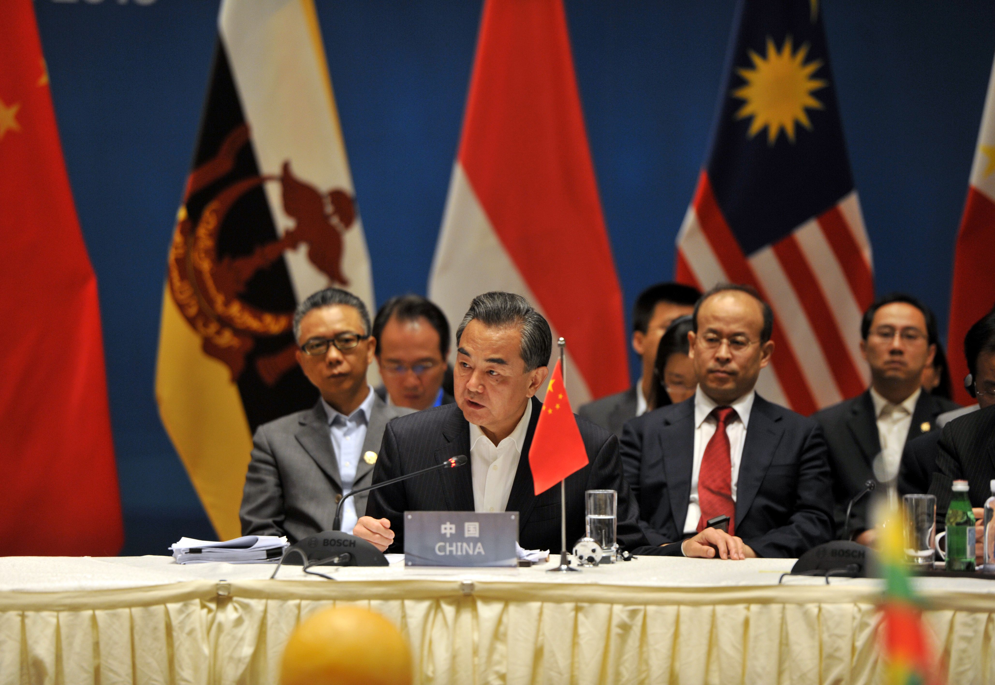 Chinese Foreign Minister Wang Yi (front) and foreign ministers from ASEAN members attend a special ASEAN-China meeting on Tuesday in Yuxi, China. | AFP-JIJI