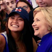 Democratic U.S. presidential candidate Hillary Clinton poses with supporters after a campaign event at Rutgers University\'s Newark campus in Newark, New Jersey, on Wednesday. | REUTERS