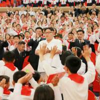 North Korean leader Kim Jong Un attends \"We Are the Happiest in the World,\" a performance of schoolchildren to celebrate the 70th founding anniversary of the Korean Children\'s Union (KCU), in this undated photo released by North Korea\'s Korean Central News Agency (KCNA) in Pyongyang Wednesday. | KCNA / REUTERS