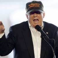 Republican presidential candidate Donald Trump speaks during a campaign rally Saturday at a private hanger at Greater Pittsburgh International Airport in Moon, Pennsylvania. | AP