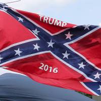 A vendor flies the confederate flag prior to a Republican U.S. presidential candidate Donald Trump rally in Pittsburgh Saturday. | REUTERS