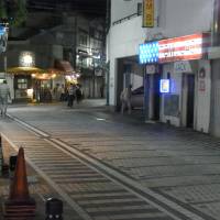 The Dobuita-Dori bar district, adjacent to the Yokosuka naval base, is all but deserted on Wednesday. | DAISUKE KIKUCHI